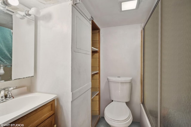 full bathroom with vanity, toilet, and enclosed tub / shower combo