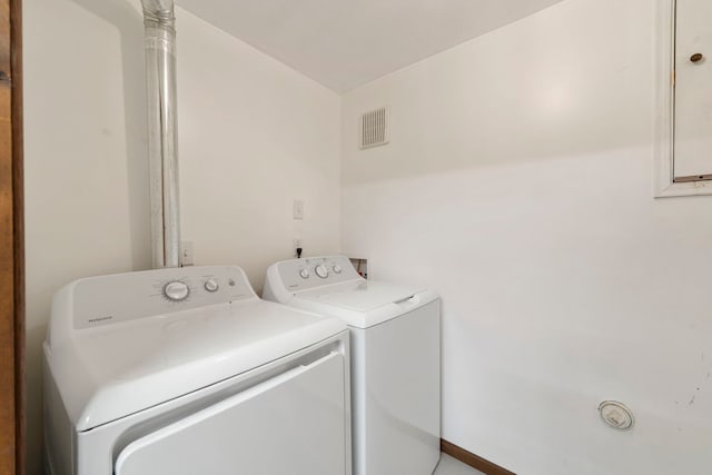 laundry room featuring independent washer and dryer