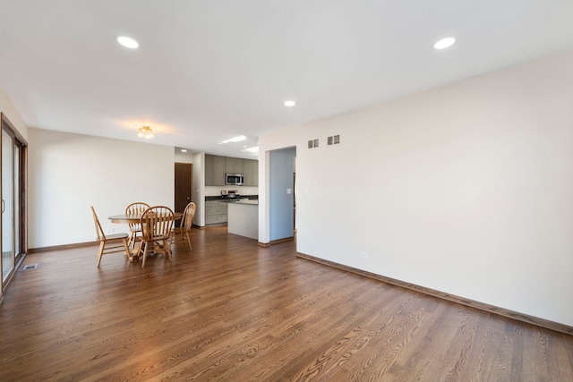 dining area with hardwood / wood-style flooring