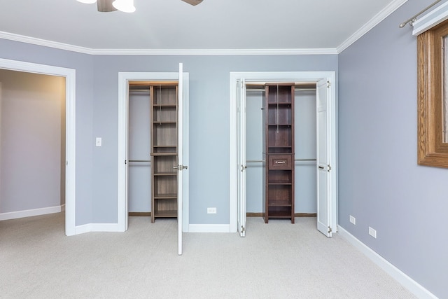 unfurnished bedroom featuring light carpet, a closet, ceiling fan, and ornamental molding