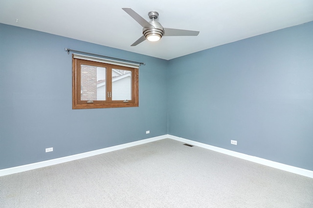 spare room featuring ceiling fan