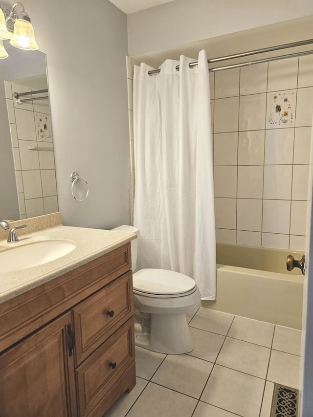 full bathroom with tile patterned flooring, vanity, shower / bath combination with curtain, and toilet