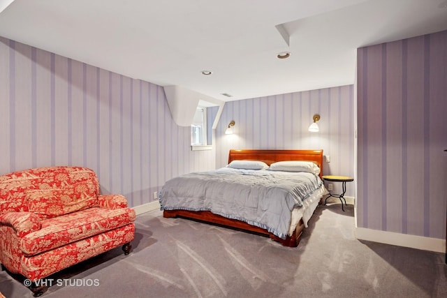 carpeted bedroom featuring baseboards, visible vents, and recessed lighting
