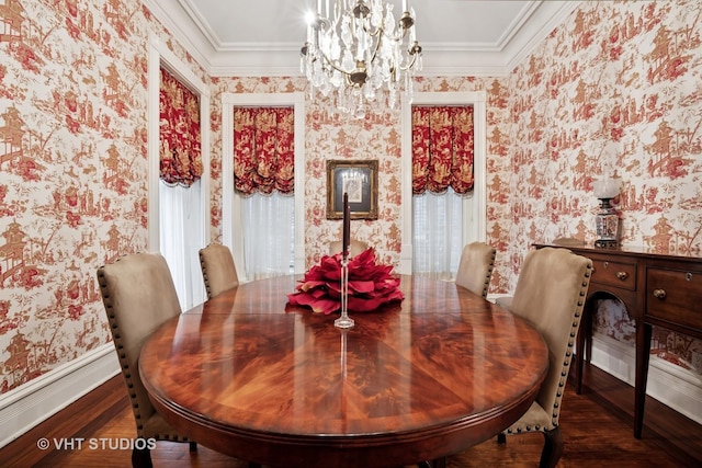 dining room with crown molding, wallpapered walls, and a notable chandelier
