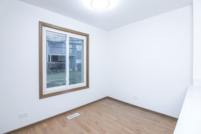 empty room with light wood-type flooring