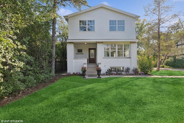 view of front of house with a front lawn