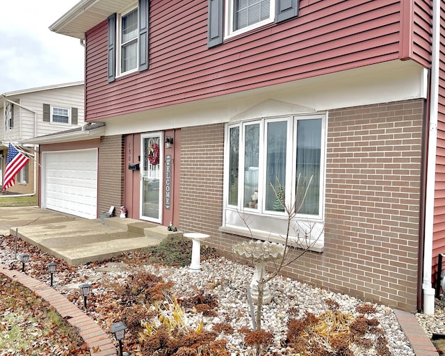 exterior space with a garage