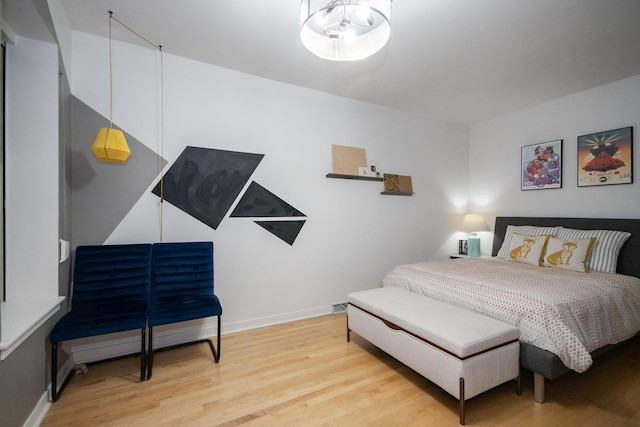 bedroom featuring light wood-type flooring