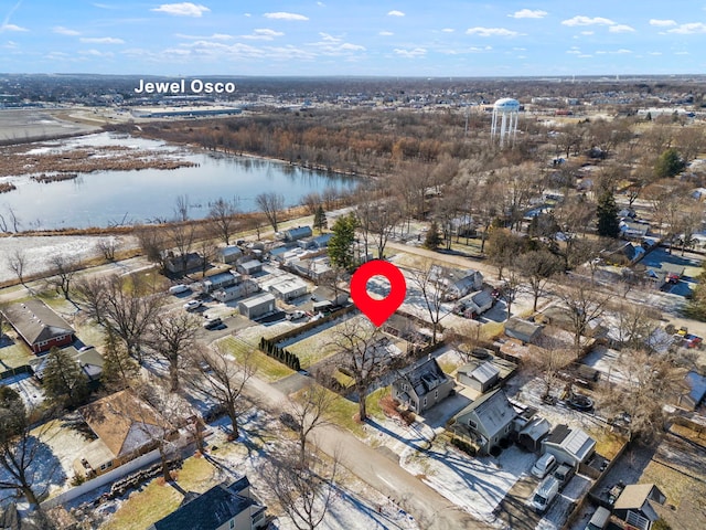 birds eye view of property featuring a water view