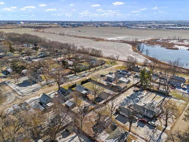 aerial view with a rural view and a water view