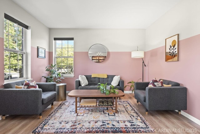 living room with light hardwood / wood-style floors