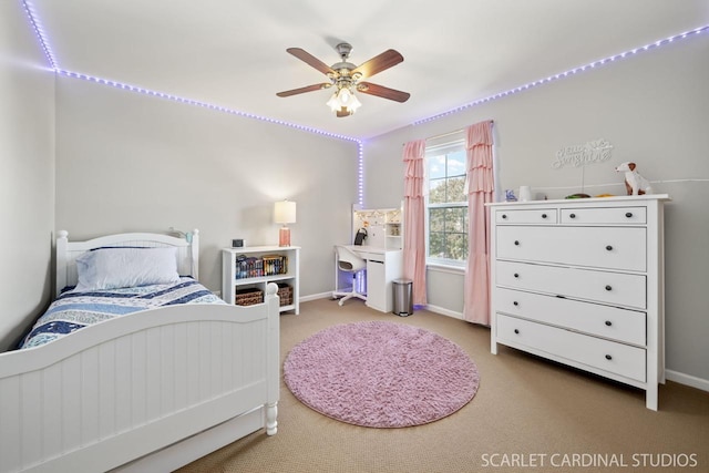 bedroom with ceiling fan and carpet flooring