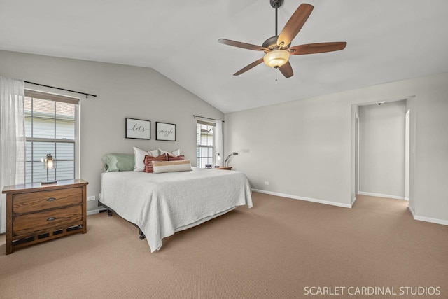 carpeted bedroom featuring ceiling fan and lofted ceiling