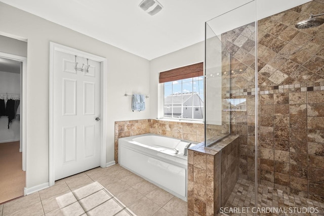 bathroom featuring independent shower and bath and tile patterned floors