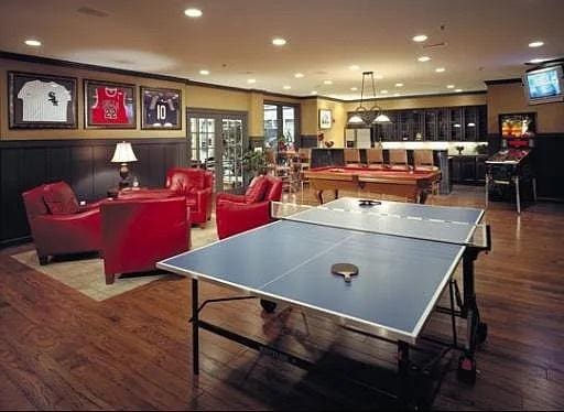 playroom with french doors, pool table, crown molding, and hardwood / wood-style floors