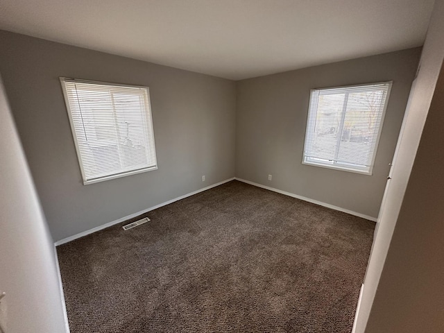 view of carpeted spare room