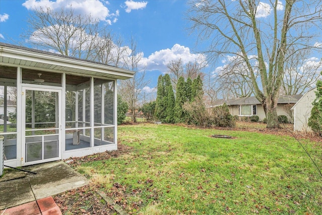 view of yard with a sunroom