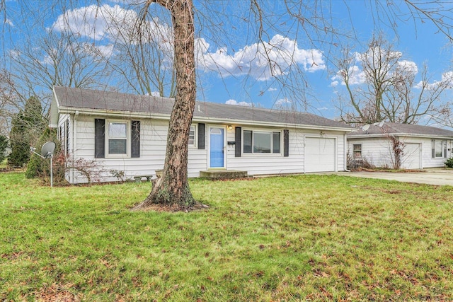 ranch-style home with a garage and a front yard