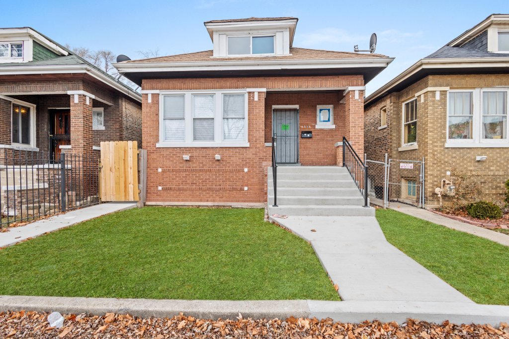 bungalow with a front lawn