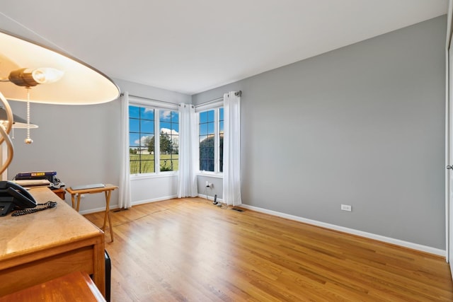 office space featuring hardwood / wood-style floors