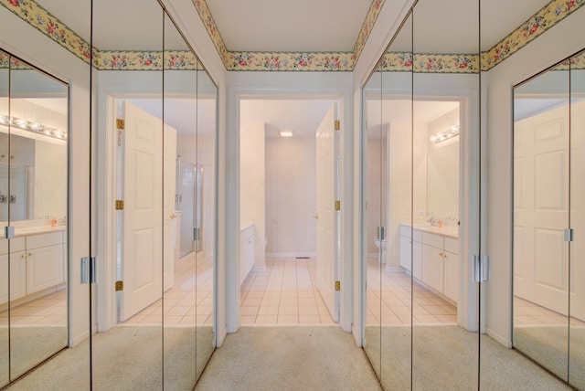 bathroom with vanity, tile patterned floors, and toilet