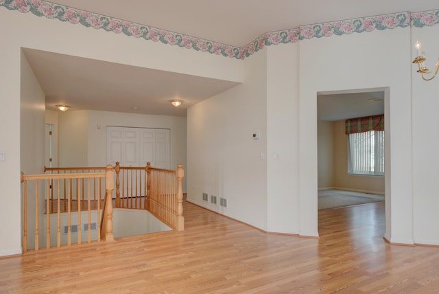 empty room with light wood-type flooring