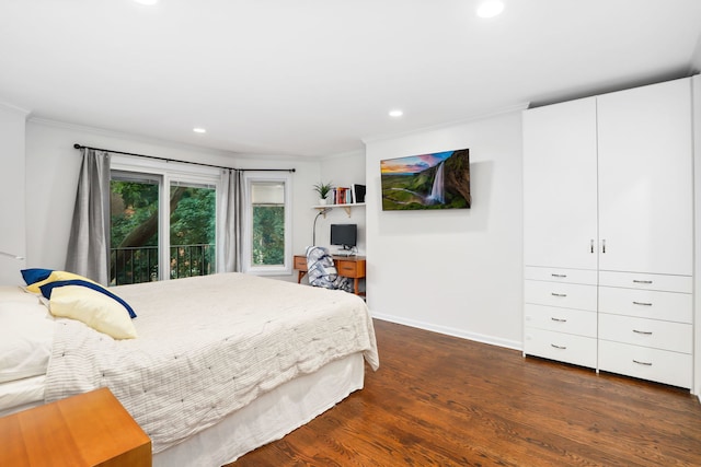 bedroom with access to exterior, crown molding, and dark wood-type flooring