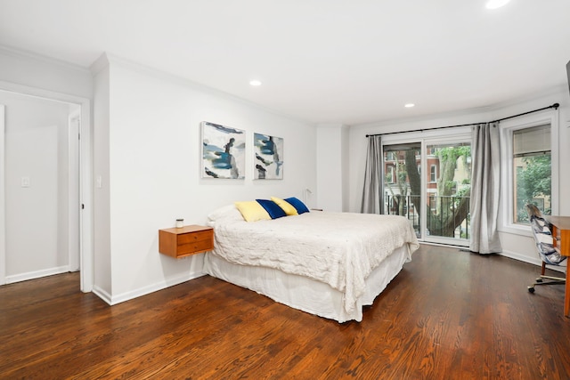 bedroom with dark hardwood / wood-style flooring, access to exterior, and crown molding