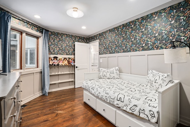 bedroom with crown molding and dark wood-type flooring