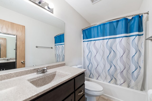 full bathroom featuring vanity, shower / tub combo, and toilet