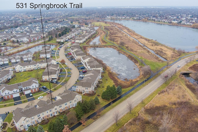 drone / aerial view featuring a water view