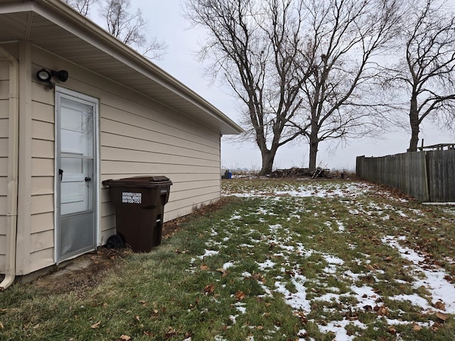 view of yard layered in snow