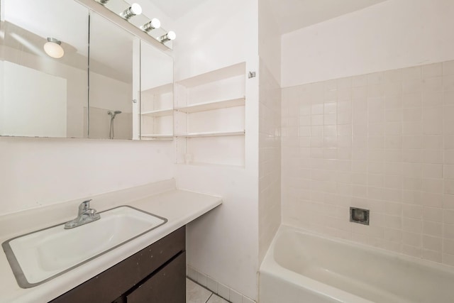 bathroom with shower / bathing tub combination, vanity, and tile patterned flooring