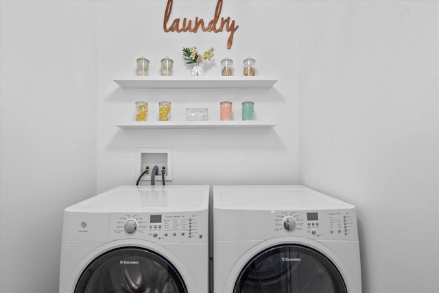 clothes washing area with independent washer and dryer