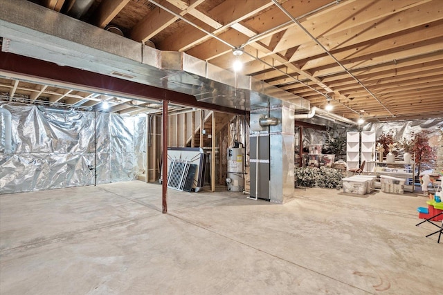 basement featuring water heater