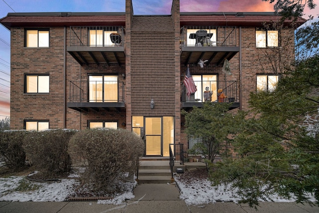 townhome / multi-family property featuring a balcony