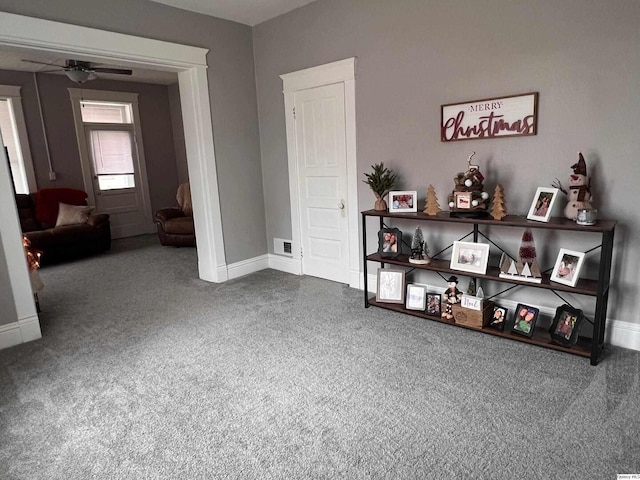 interior space featuring ceiling fan