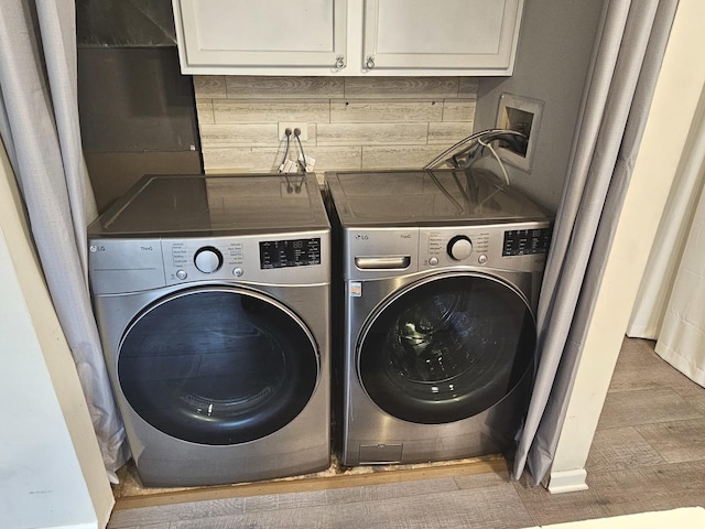 laundry area featuring separate washer and dryer