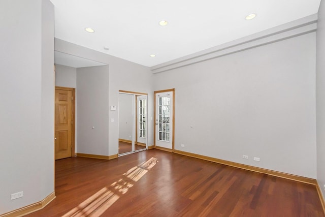 empty room featuring wood-type flooring