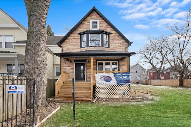 233 N Lorel Ave, Chicago, IL 60644 - view of front of property with roof with shingles, stone siding, and a porch