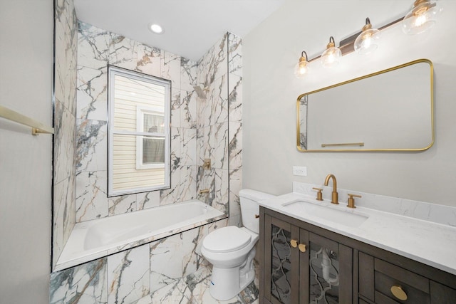 bathroom with toilet, washtub / shower combination, and vanity