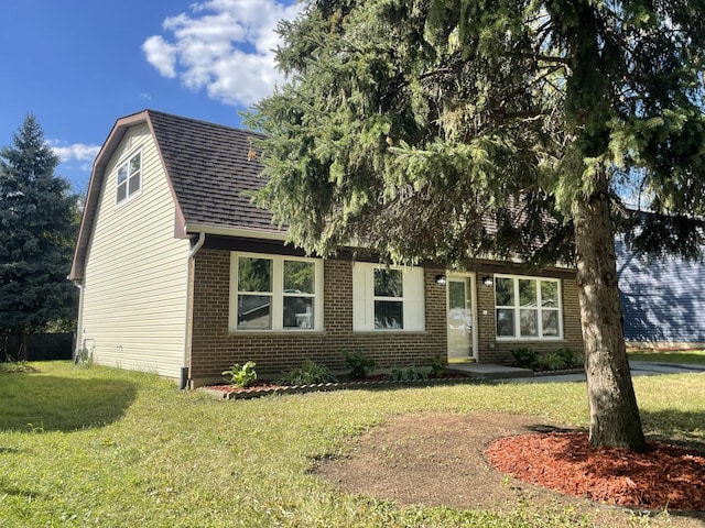 view of front of home with a front yard