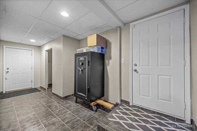 entryway with a drop ceiling