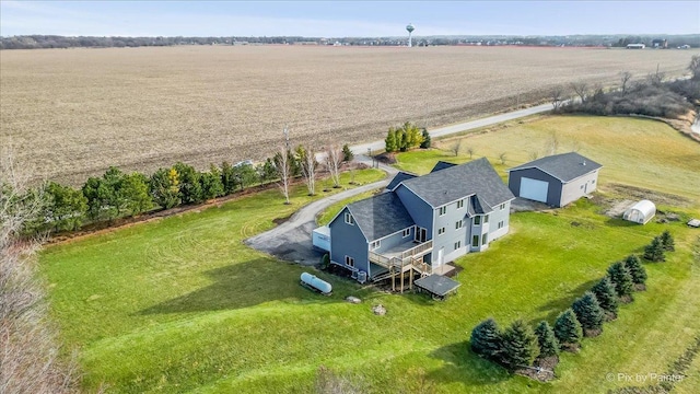 birds eye view of property featuring a rural view