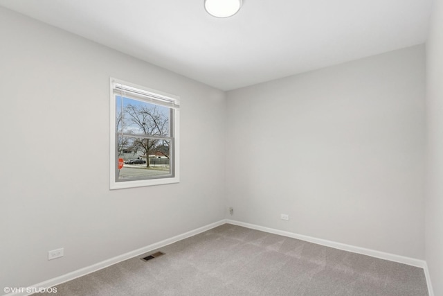 view of carpeted spare room