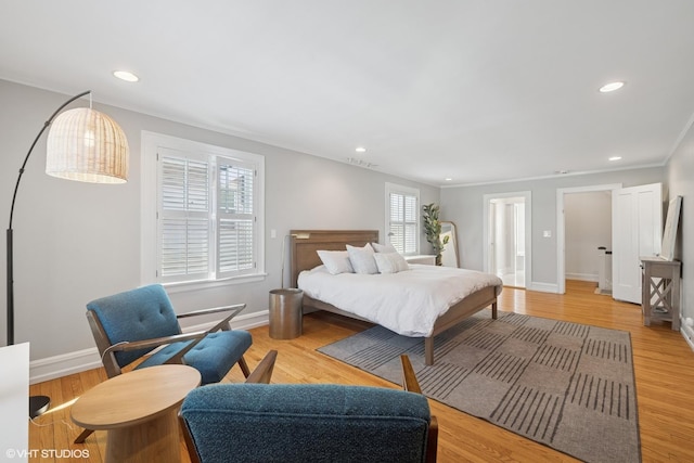 bedroom featuring recessed lighting, baseboards, visible vents, and light wood finished floors