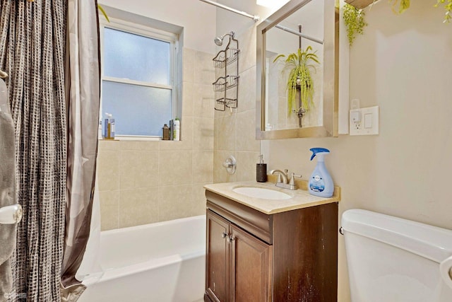 full bathroom with vanity, toilet, and shower / bath combo with shower curtain