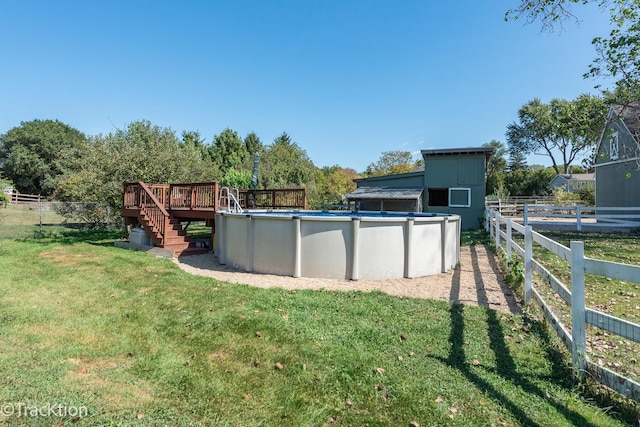 view of yard featuring a swimming pool side deck