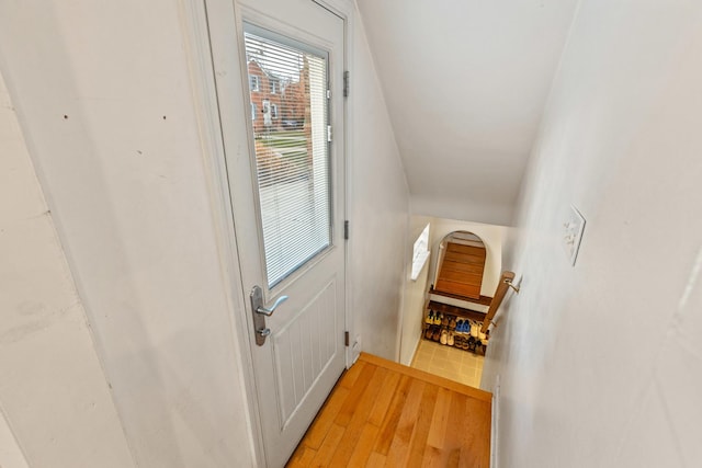 doorway to outside featuring wood-type flooring