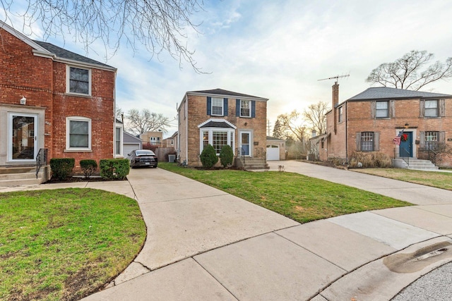 view of front facade featuring a front lawn and a garage